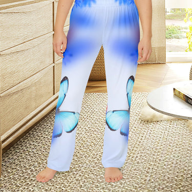 Girls’ butterfly lounge pants with blue butterfly and garden design, soft brushed polyester, elastic waistband, part of Paisley’s Corner Collection, ideal for sleepovers and cozy home wear, girl in butterfly lounge pants